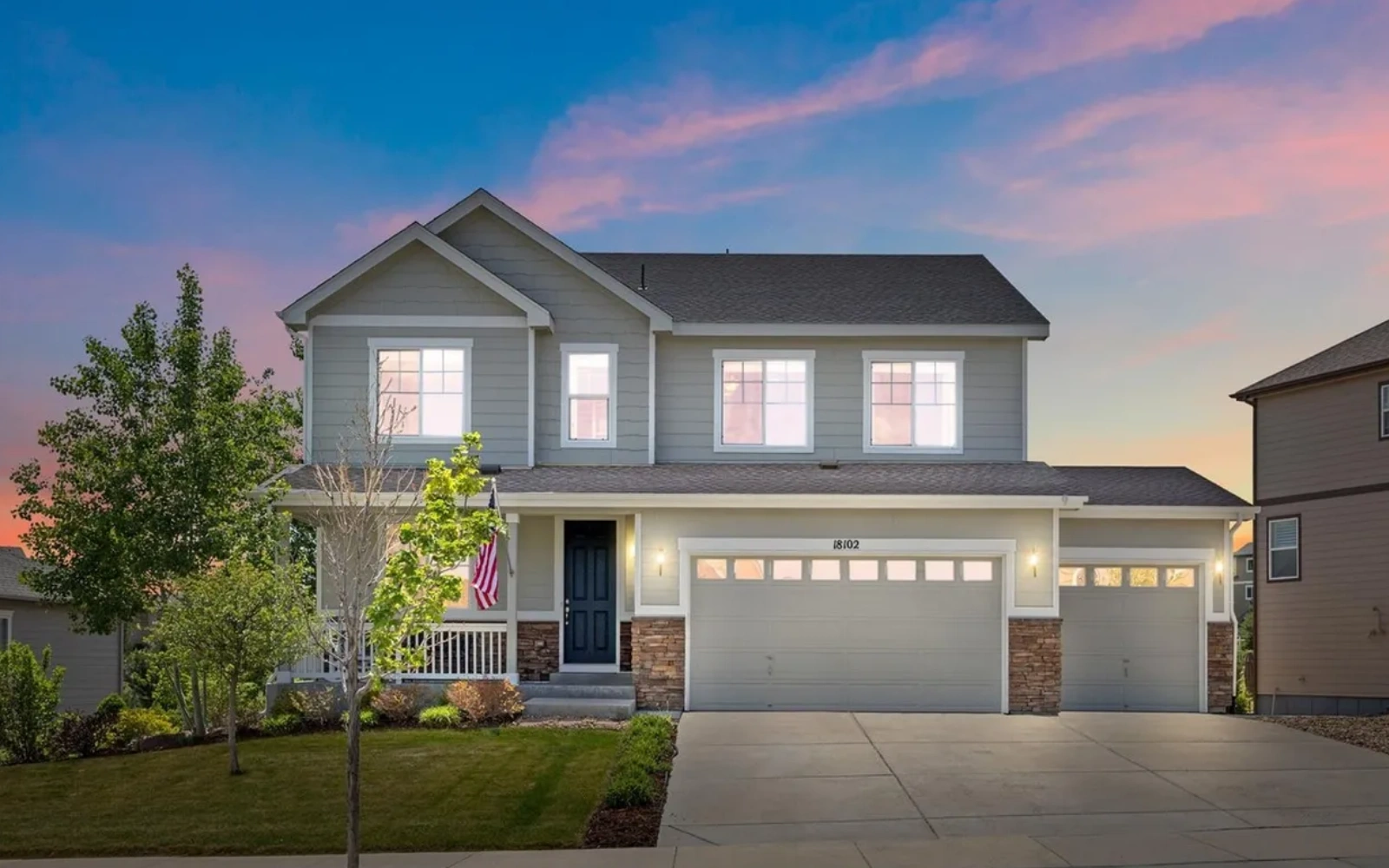 Modern two-storey house at sunset